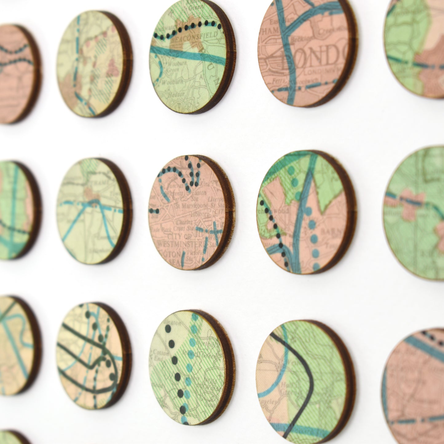 One Hundred London Infrastructure Pink and Green Map Dots Collage