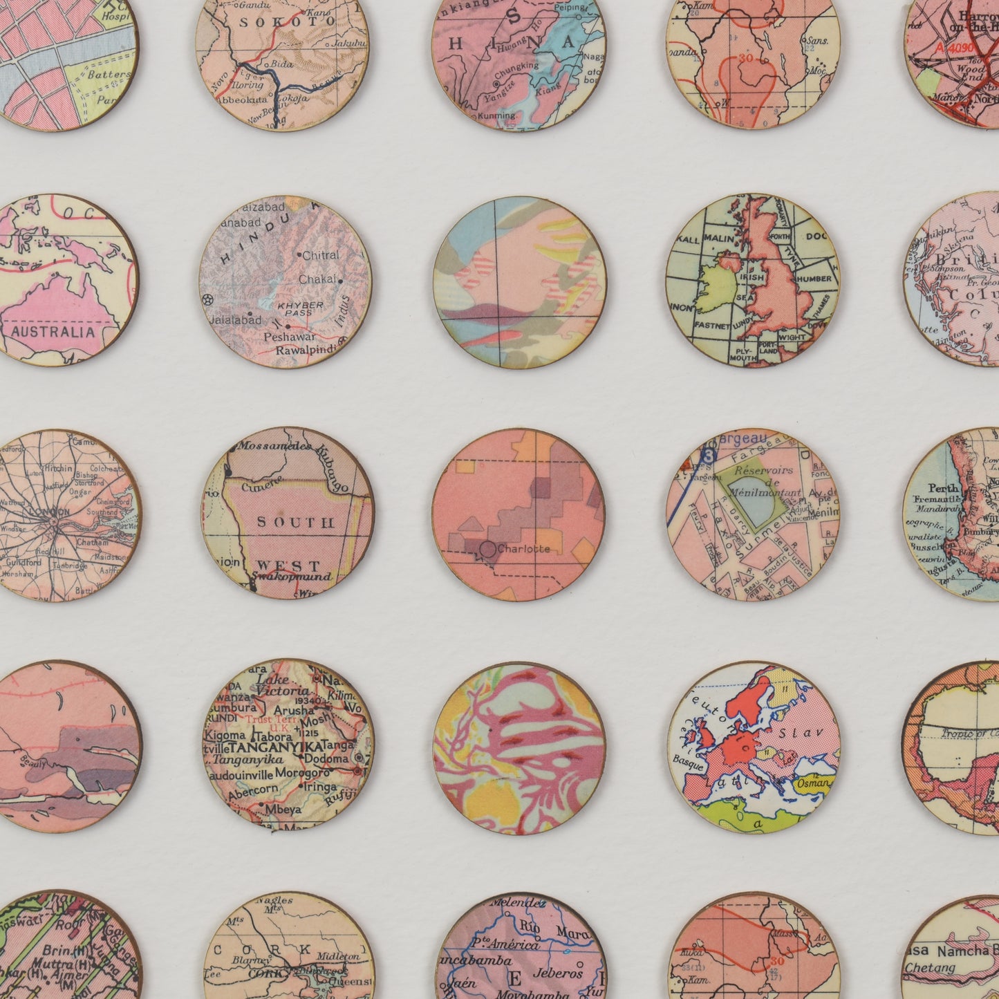 One Hundred Pink Map Dots Collage