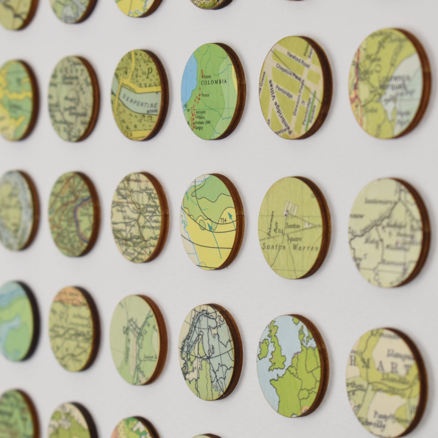 One Hundred Green Map Dots Collage