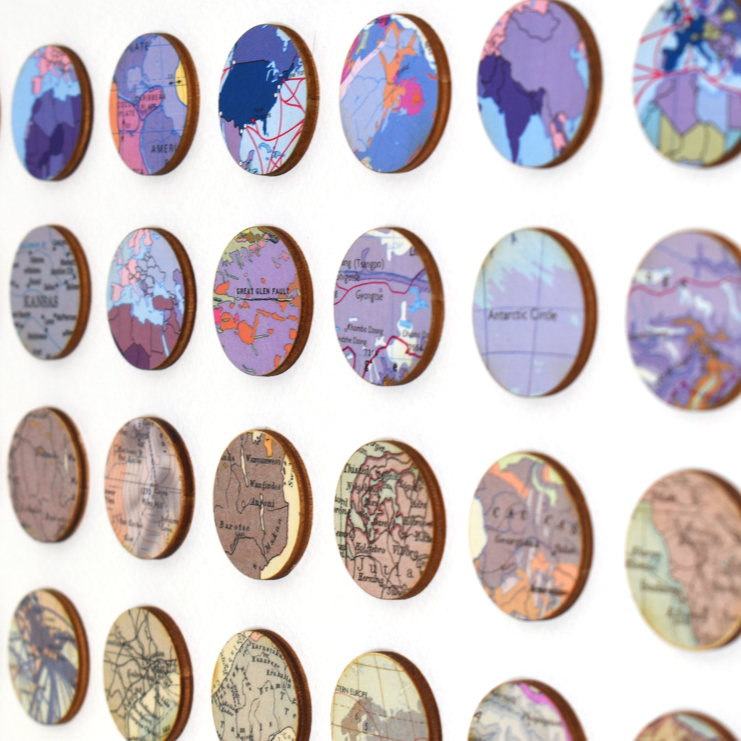 One Hundred Red to Purple Map Dots Collage