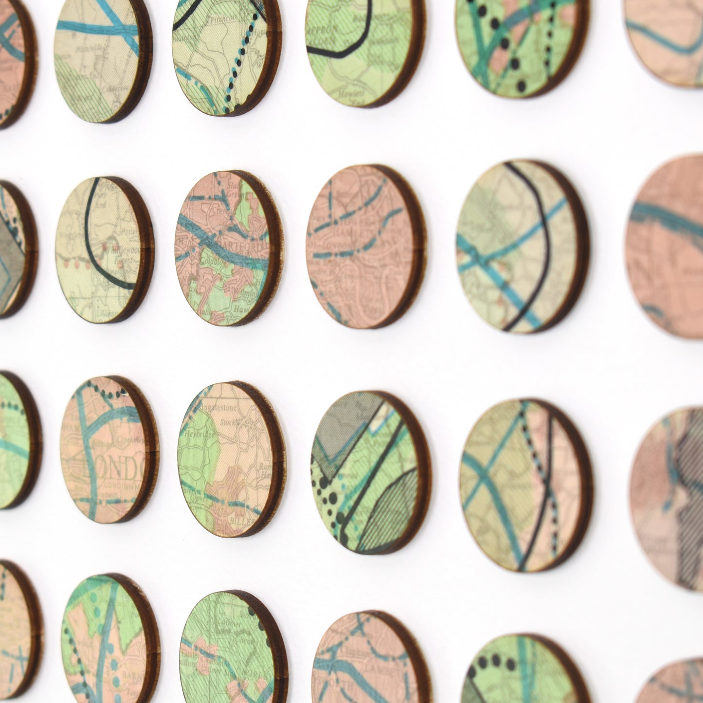 One Hundred London Infrastructure Pink and Green Map Dots Collage