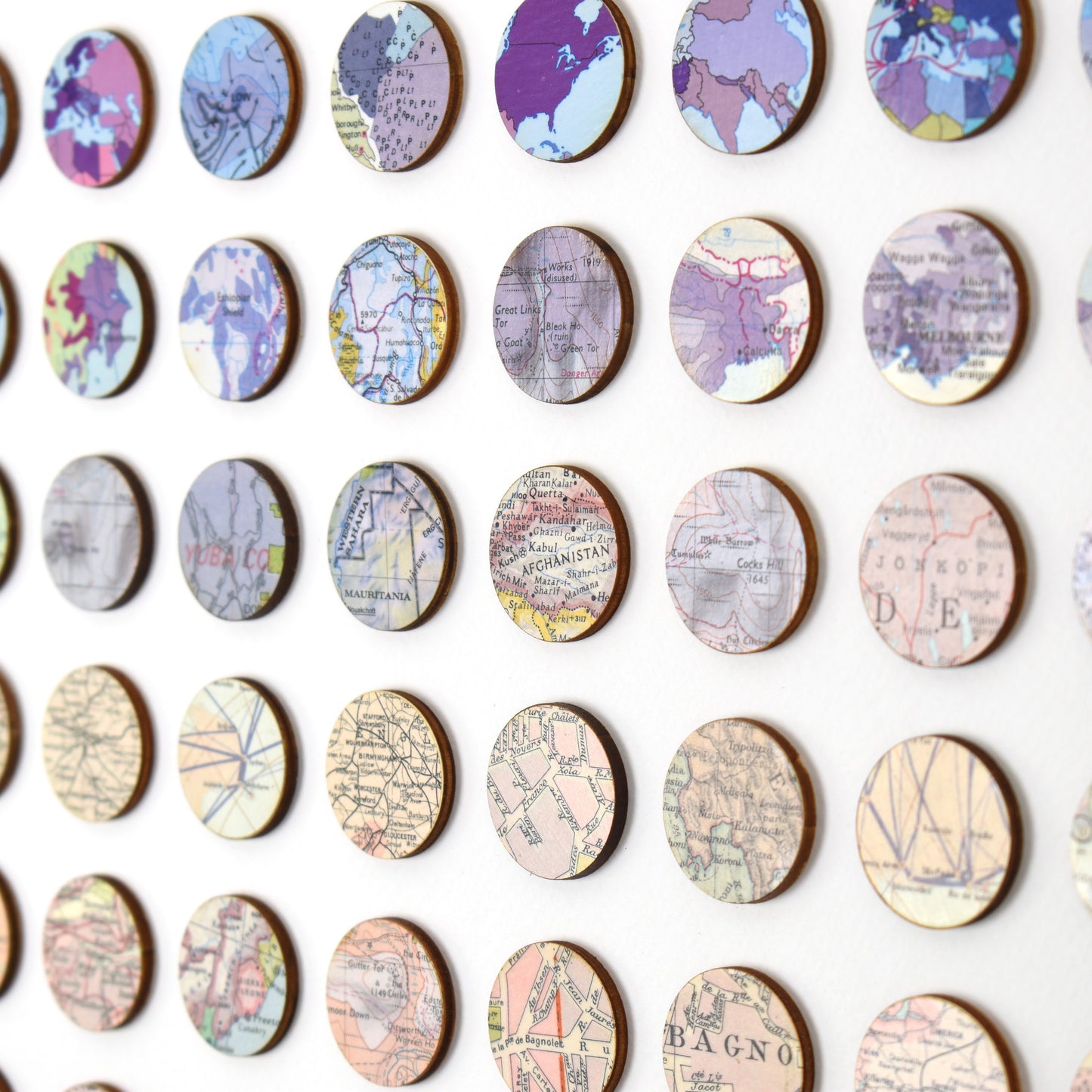 One Hundred Purple to Pink Map Dots Collage