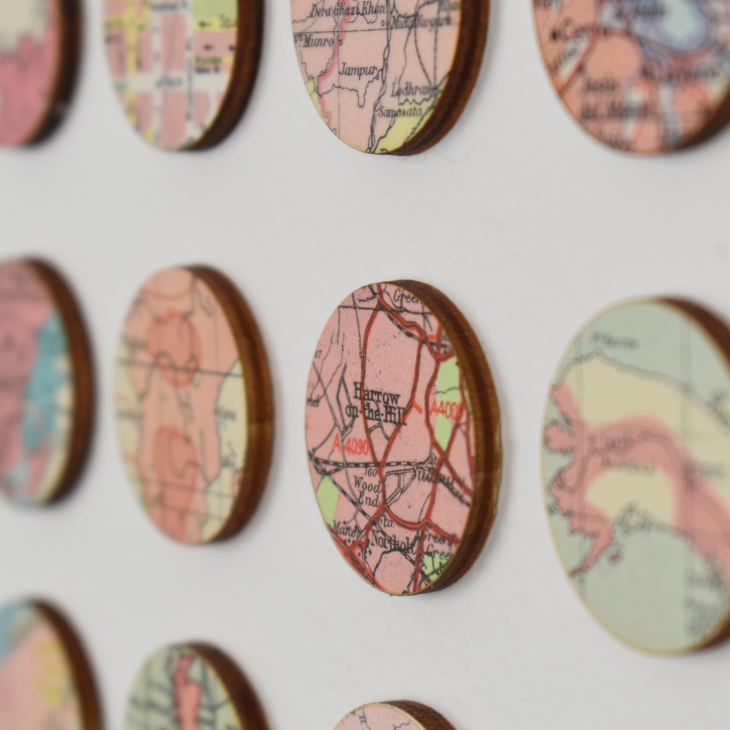 One Hundred Pink Map Dots Collage