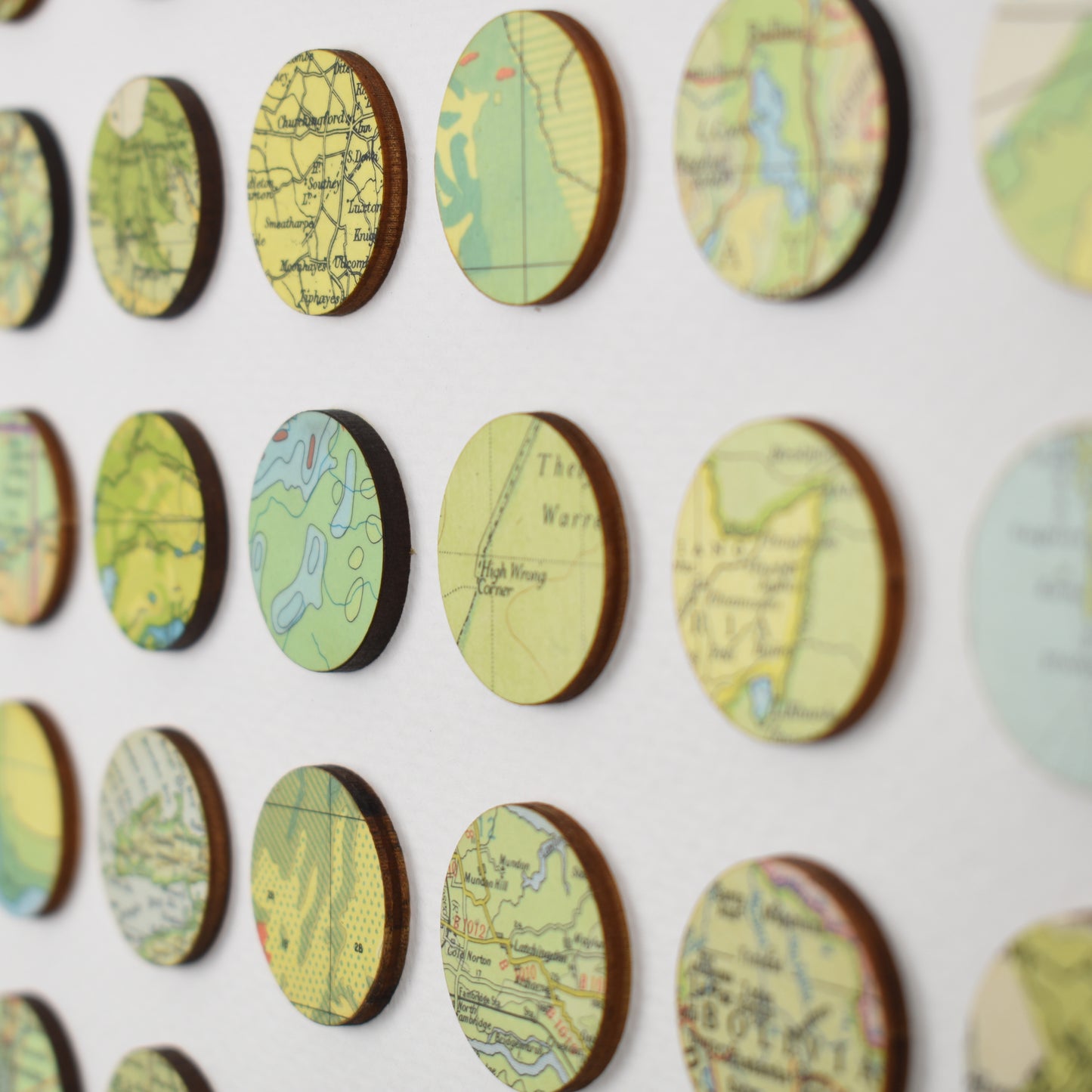 One Hundred Green Map Dots Collage