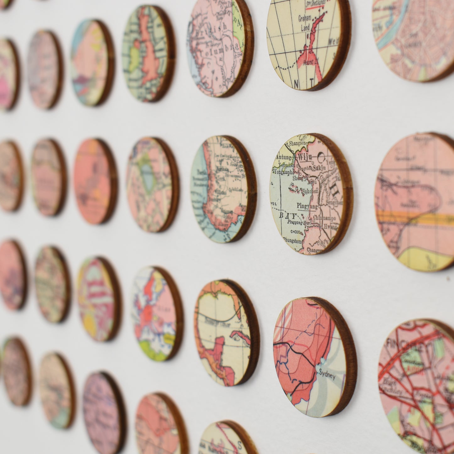 One Hundred Pink Map Dots Collage