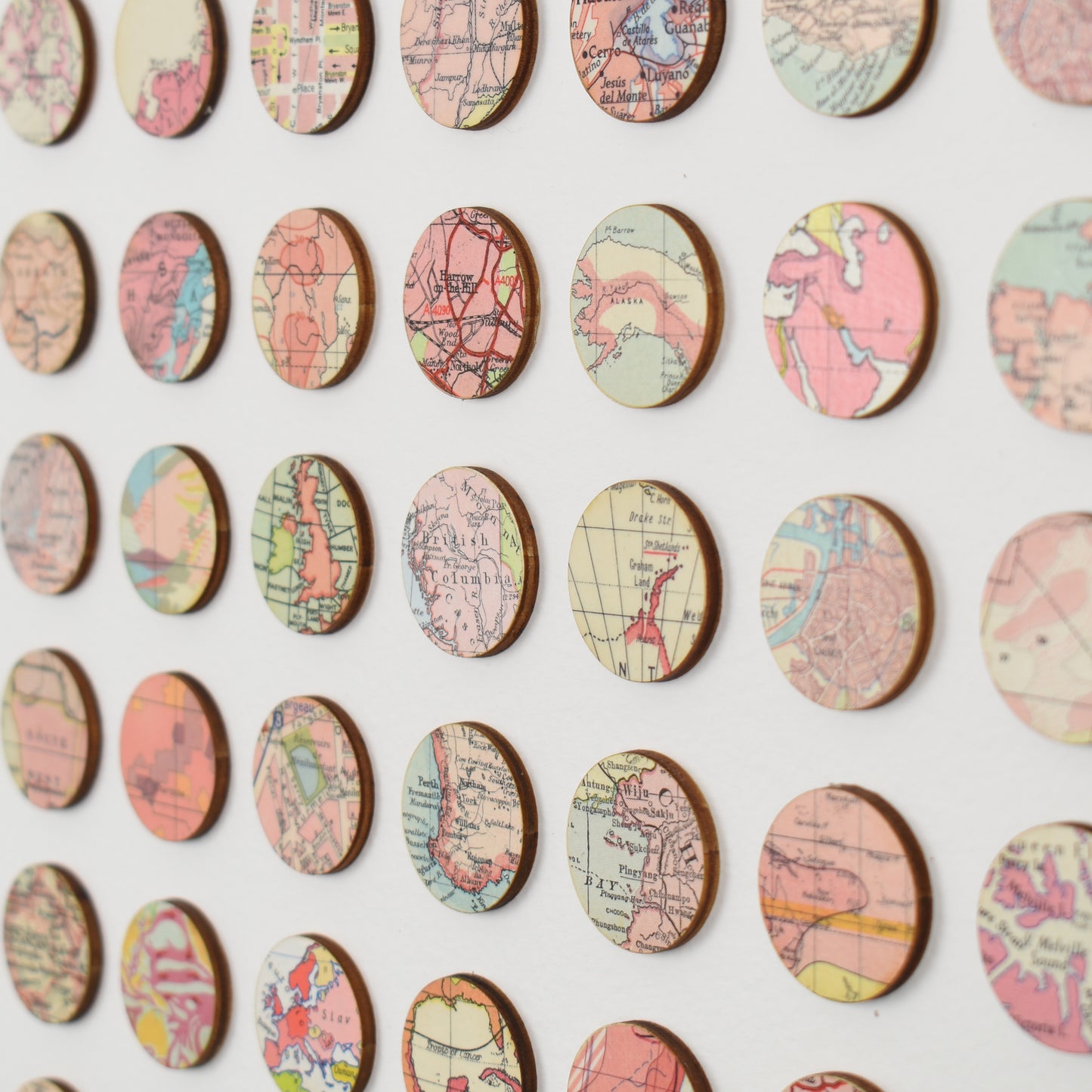 One Hundred Pink Map Dots Collage