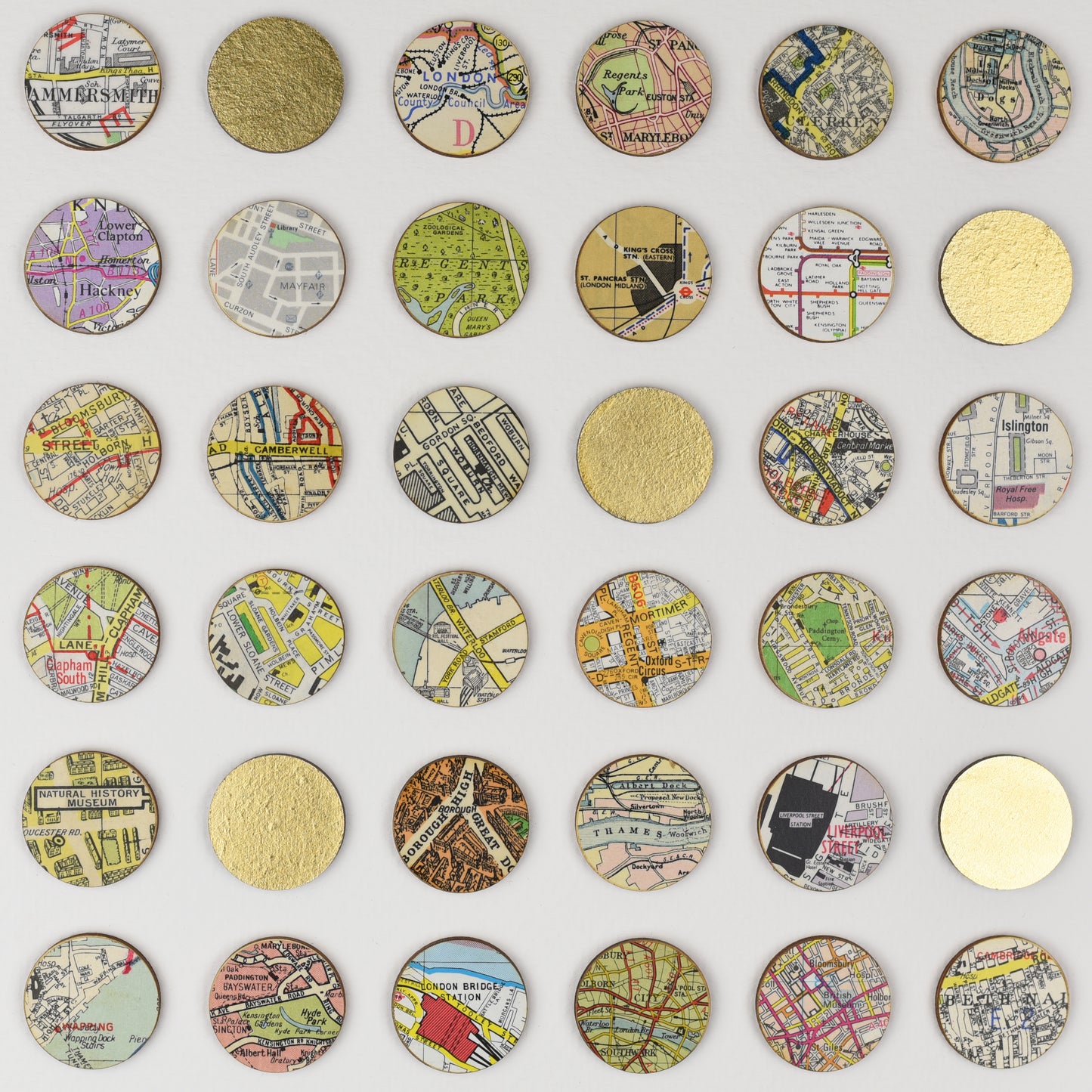 Detail of London map dot wall art by Amelia Coward with gold leaf