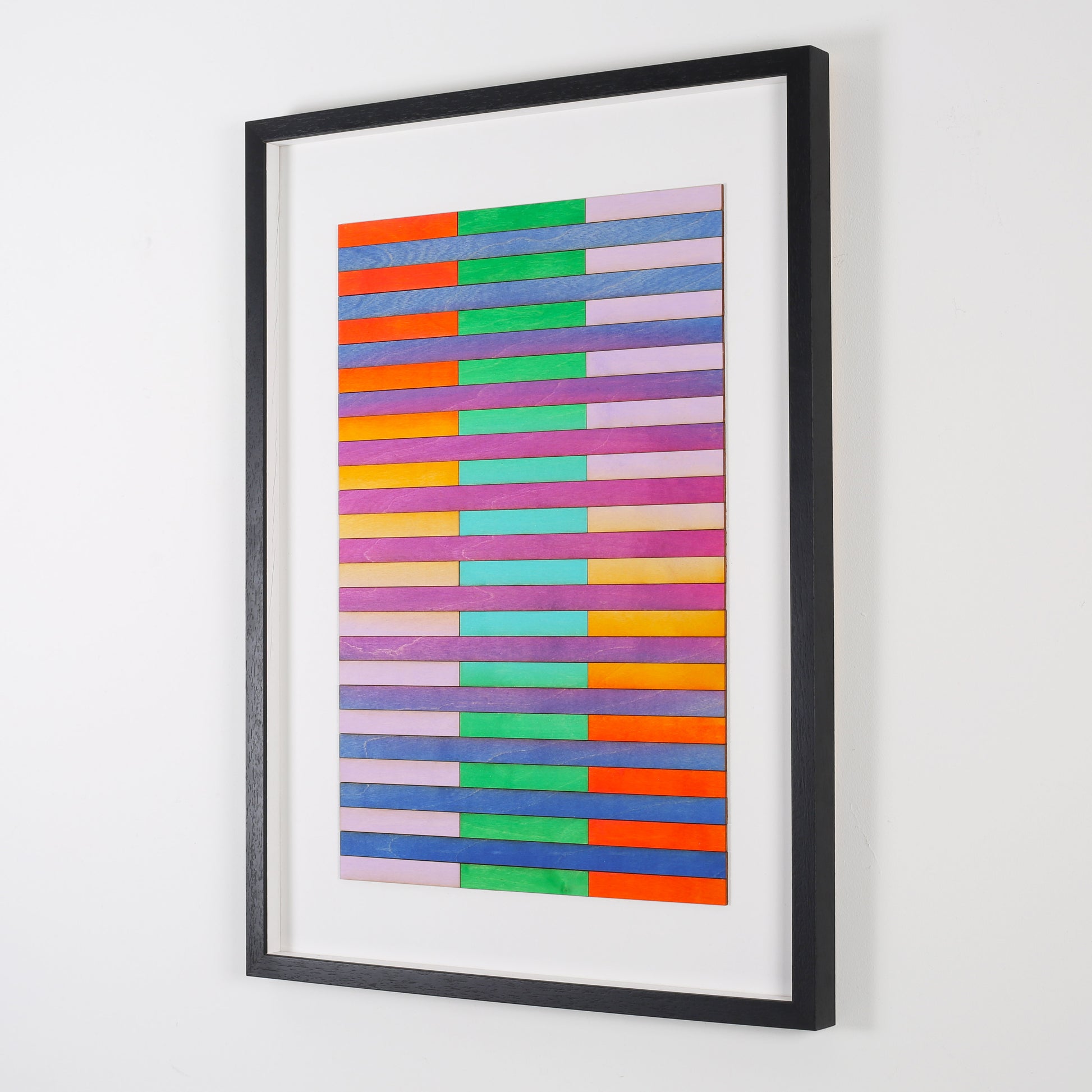 Side view of colour study by Amelia coward, featuring horizontal stripes in blue, green, pink, and yellow tones