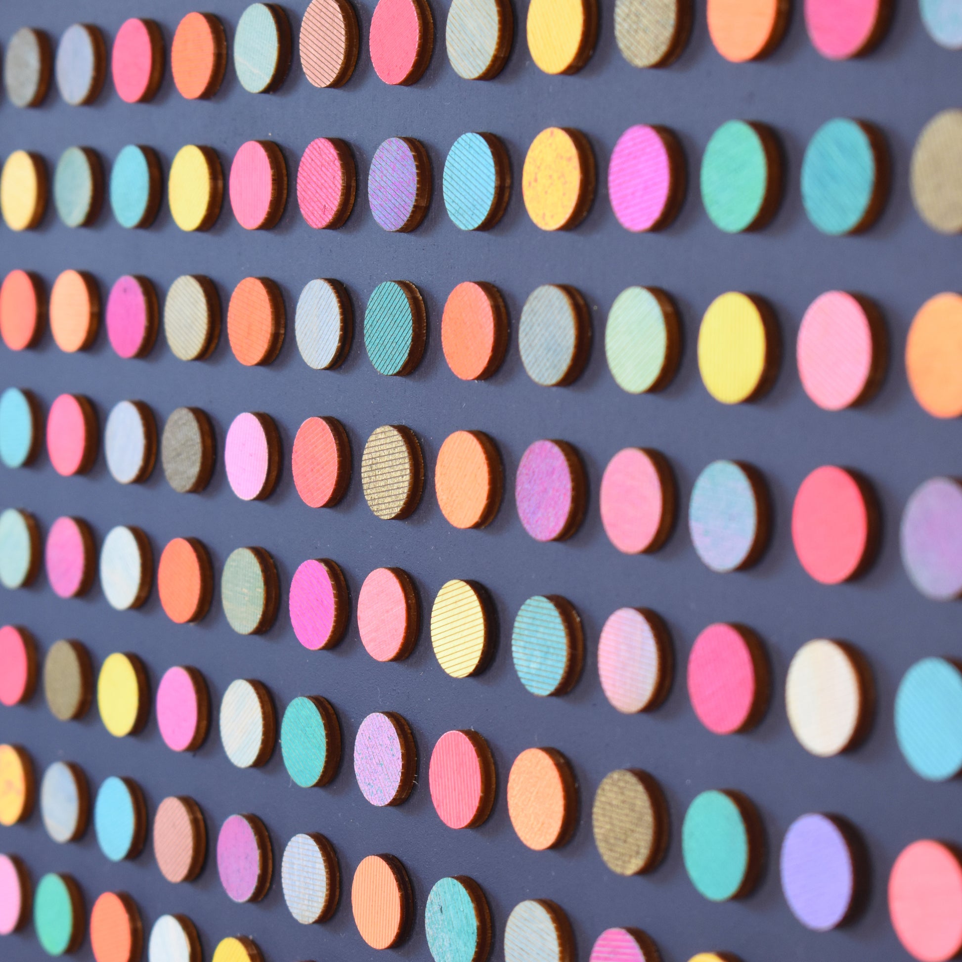 close up of Painted Dot Collage on Black by Amelia Coward