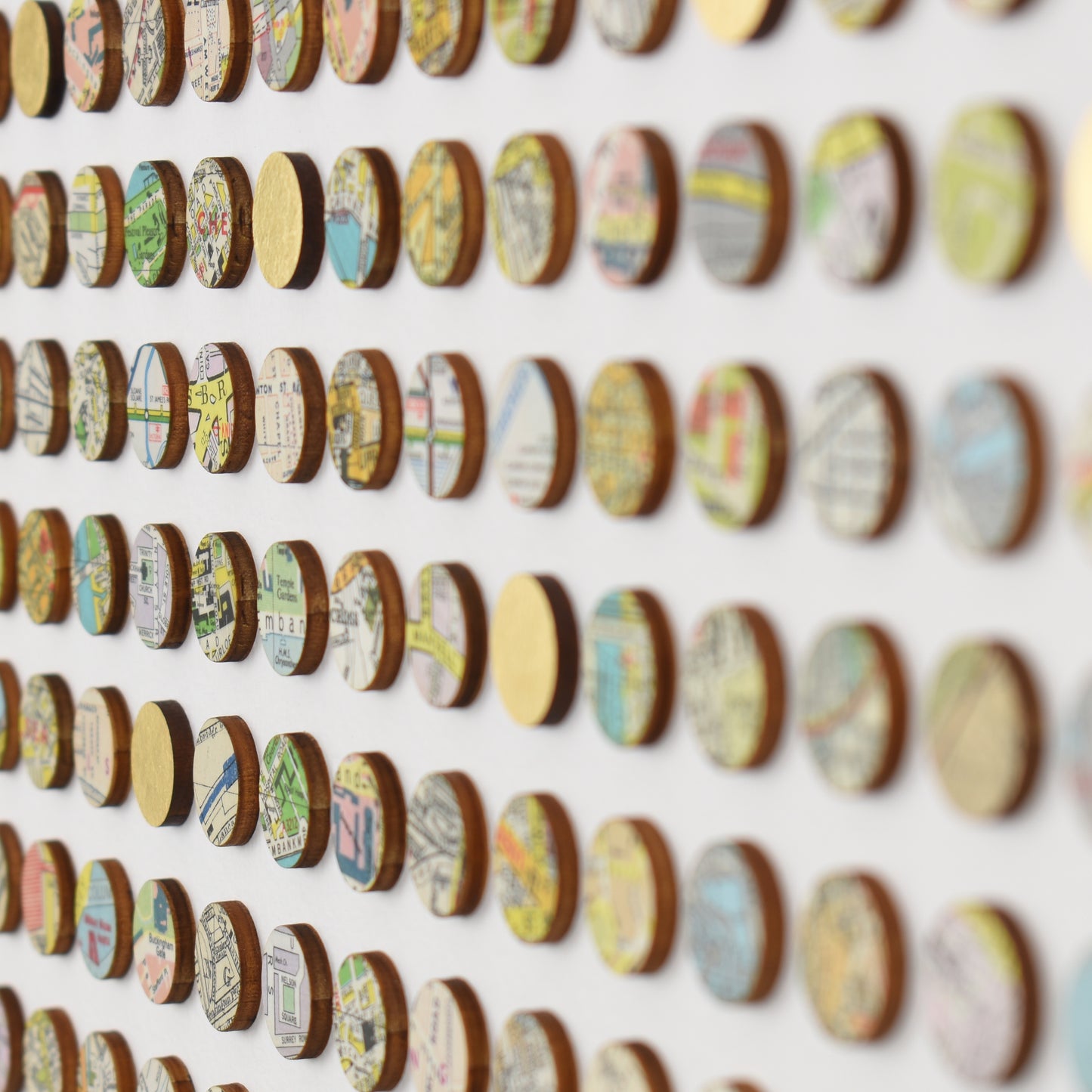 Side angle close up of map dots wall art by Amelia Coward